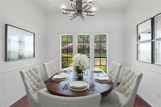 5913 Woodmere Dr, Corpus Christi, TX 78414 - dining space with a chandelier, wood finished floors, crown molding, and baseboards