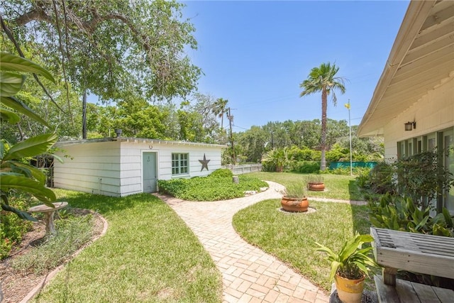 144 Cordula St, Corpus Christi, TX 78411 - view of green lawn featuring an outbuilding