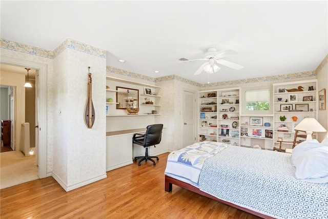 144 Cordula St, Corpus Christi, TX 78411 - bedroom with wood finished floors, baseboards, wallpapered walls, and a ceiling fan