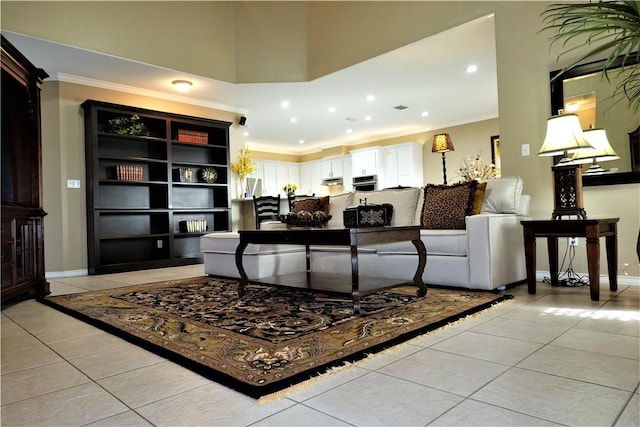 living room featuring crown molding and light tile patterned flooring