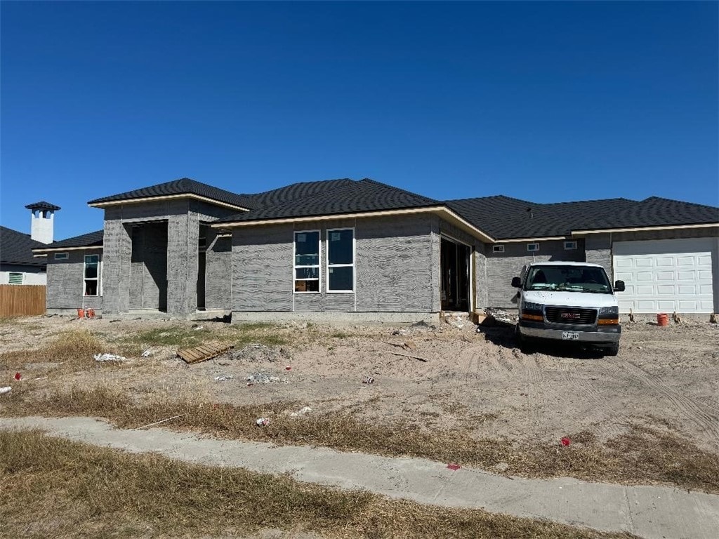 view of front of property featuring a garage