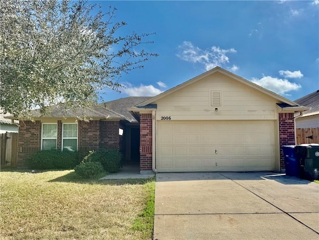 single story home with a garage and a front yard