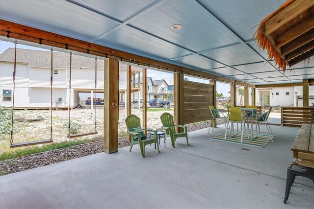 sunroom / solarium with a residential view