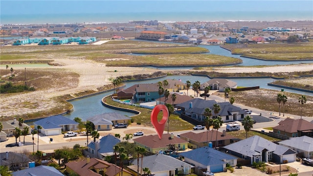 aerial view featuring a water view and a residential view