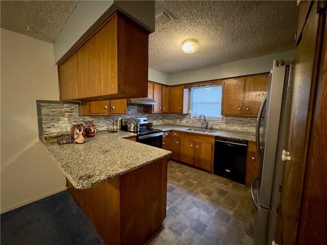 1203 N Hackberry St, Bishop, TX 78343 - kitchen featuring electric stove, a sink, freestanding refrigerator, black dishwasher, and a peninsula