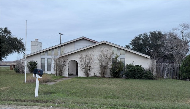 1203 N Hackberry St, Bishop, TX 78343 - view of front of house featuring fence and a front yard