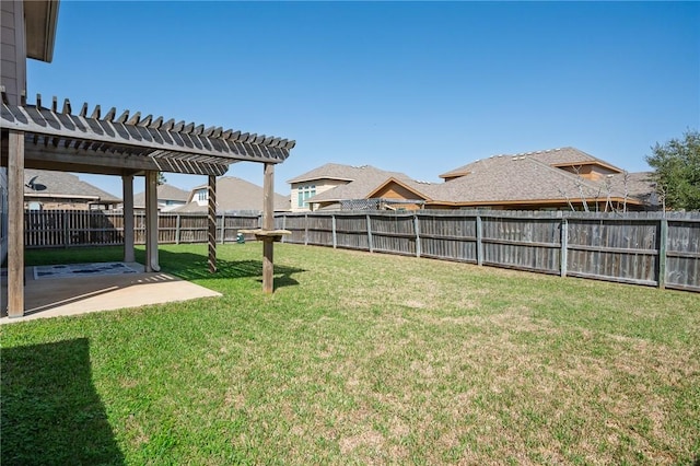 view of yard featuring a patio area, a fenced backyard, and a pergola