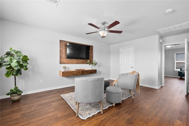 dining space with ceiling fan, wood finished floors, visible vents, and baseboards