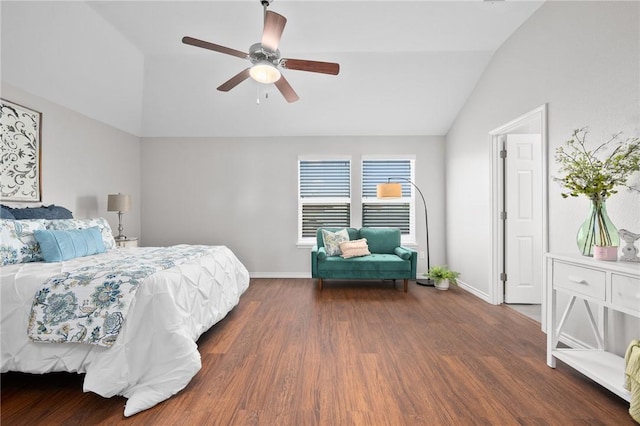 bedroom with lofted ceiling, ceiling fan, baseboards, and wood finished floors