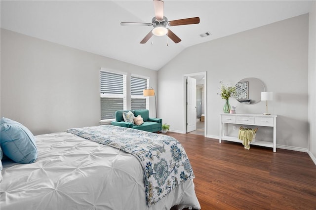 bedroom featuring lofted ceiling, ceiling fan, wood finished floors, visible vents, and baseboards