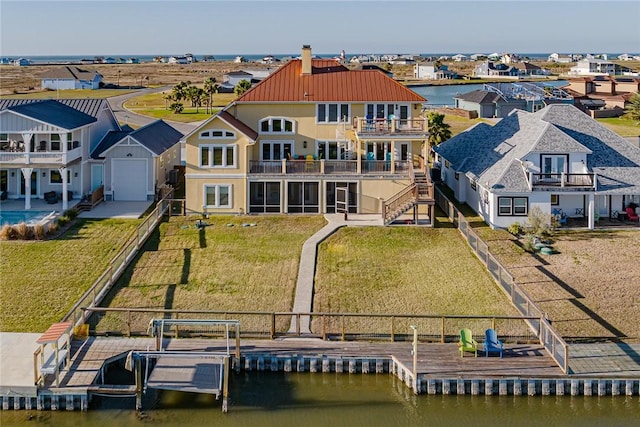 exterior space featuring a water view and a residential view
