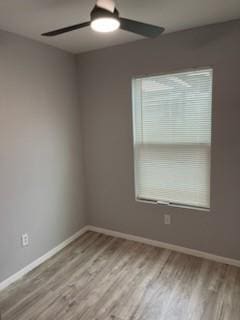 4414 Valdez Dr, Corpus Christi, TX 78416 - unfurnished room featuring a ceiling fan, light wood-style flooring, and baseboards