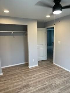 4414 Valdez Dr, Corpus Christi, TX 78416 - unfurnished bedroom with baseboards, wood finished floors, a closet, and recessed lighting
