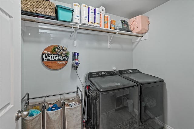 laundry room featuring washing machine and dryer