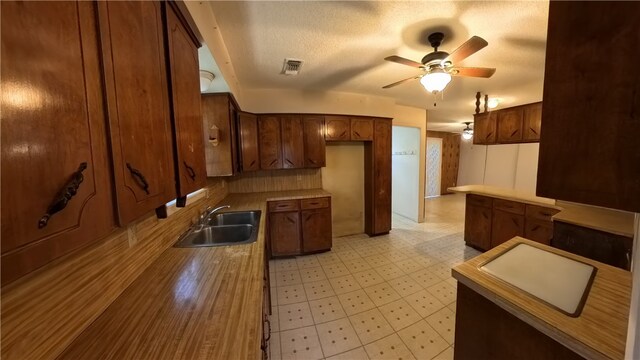 257 N 9th St, Aransas Pass, TX 78336 - kitchen featuring a ceiling fan and light flooring
