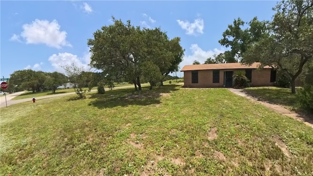 257 N 9th St, Aransas Pass, TX 78336 - view of grassy yard