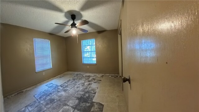 257 N 9th St, Aransas Pass, TX 78336 - unfurnished room featuring ceiling fan and a textured ceiling