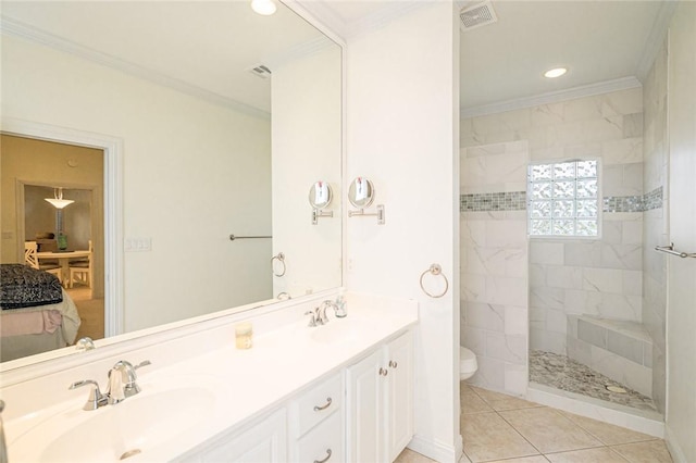 bathroom featuring a walk in shower, toilet, visible vents, and a sink