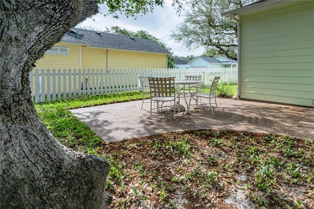view of patio / terrace with fence and outdoor dining area