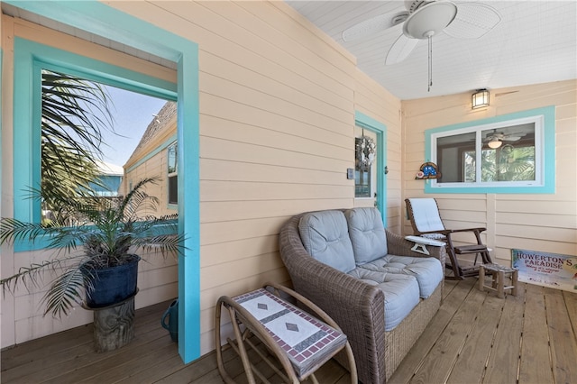 exterior space featuring ceiling fan