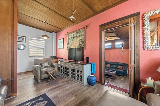 sitting room featuring wood ceiling and hardwood / wood-style floors