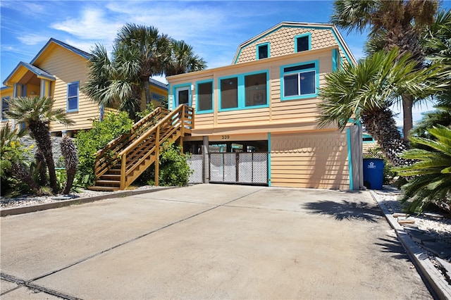 view of front of home with a carport