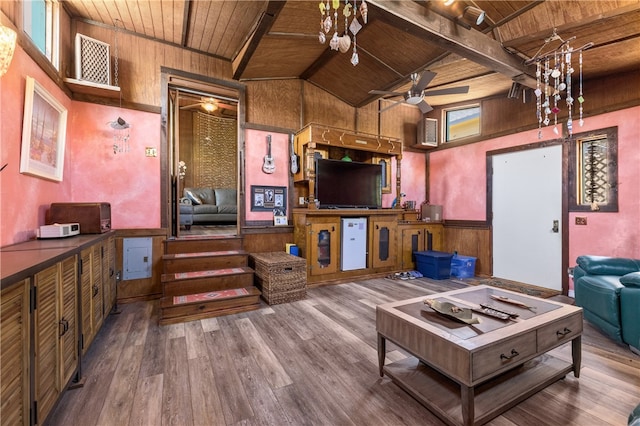 interior space featuring wooden ceiling, ceiling fan, beam ceiling, and hardwood / wood-style floors