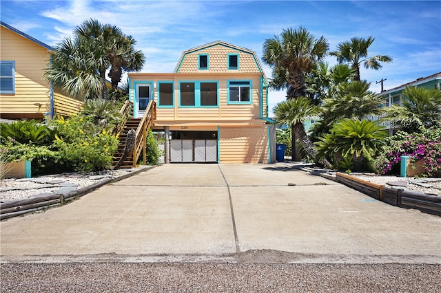 view of front of property featuring a carport