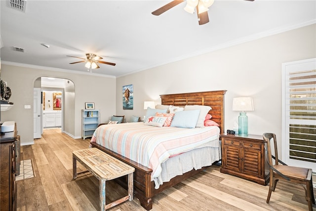 bedroom featuring ornamental molding, light hardwood / wood-style floors, and ceiling fan