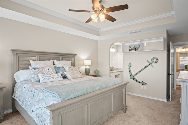 bedroom with light colored carpet, a raised ceiling, ceiling fan, and crown molding