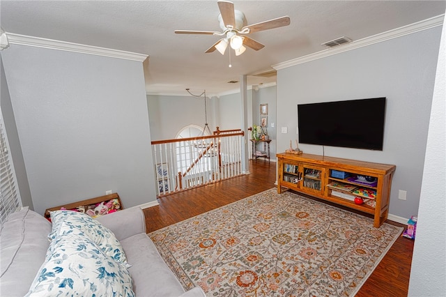 7710 Cisco, Corpus Christi, TX 78413 - living area featuring ornamental molding, ceiling fan, and wood finished floors