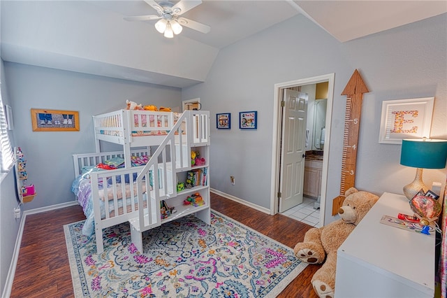 7710 Cisco, Corpus Christi, TX 78413 - bedroom featuring wood finished floors, vaulted ceiling, and connected bathroom