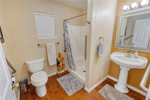 7710 Cisco, Corpus Christi, TX 78413 - bathroom with wood finished floors and a shower stall