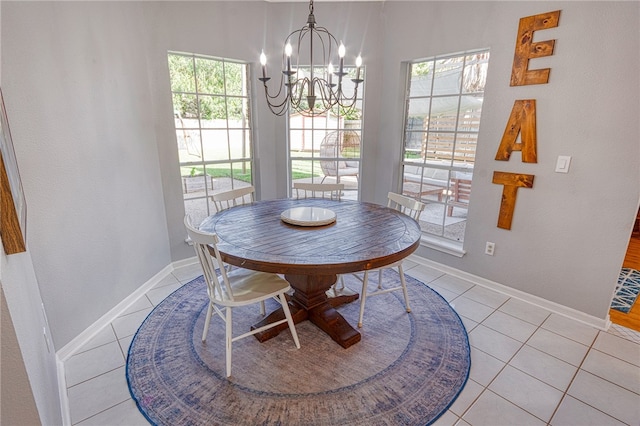 7710 Cisco, Corpus Christi, TX 78413 - dining room featuring a chandelier and light tile patterned flooring