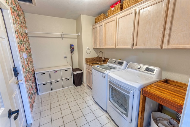 7710 Cisco, Corpus Christi, TX 78413 - laundry area with cabinet space, independent washer and dryer, and light tile patterned floors