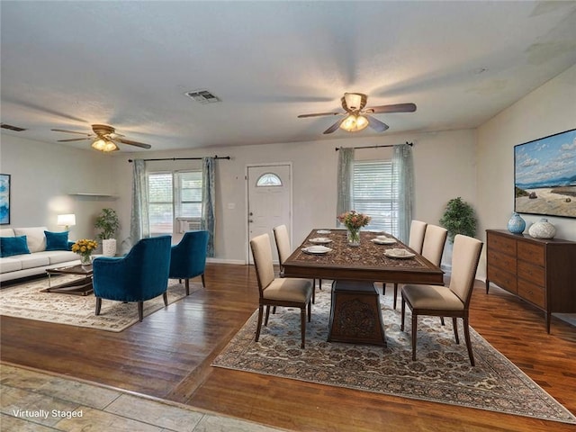 1809 Merriman Ave, Corpus Christi, TX 78412 - dining room with wood finished floors, visible vents, and ceiling fan