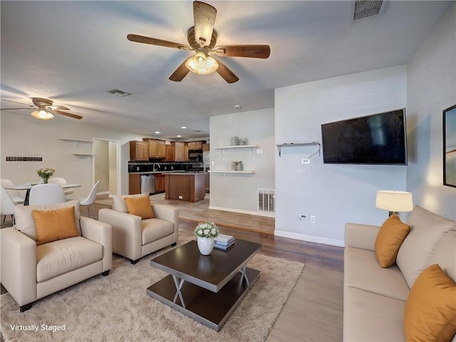 1809 Merriman Ave, Corpus Christi, TX 78412 - living room featuring visible vents and a ceiling fan