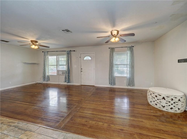 1809 Merriman Ave, Corpus Christi, TX 78412 - foyer entrance with ceiling fan, wood finished floors, and visible vents