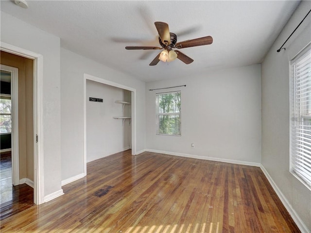 1809 Merriman Ave, Corpus Christi, TX 78412 - unfurnished bedroom with baseboards, a ceiling fan, wood finished floors, and a closet