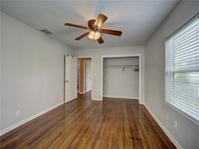 1809 Merriman Ave, Corpus Christi, TX 78412 - unfurnished bedroom with wood finished floors, a closet, ceiling fan, baseboards, and visible vents