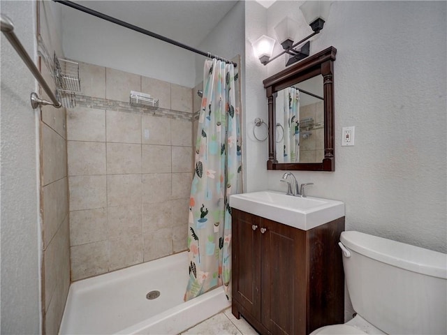 1809 Merriman Ave, Corpus Christi, TX 78412 - full bathroom featuring a shower stall, toilet, vanity, and a textured wall