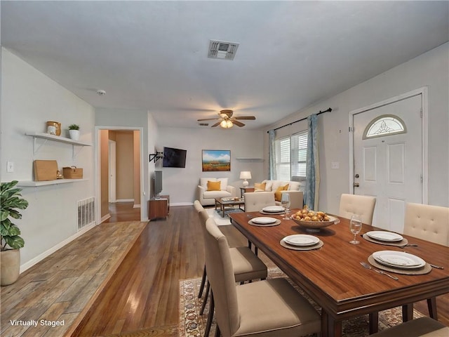 1809 Merriman Ave, Corpus Christi, TX 78412 - dining space featuring baseboards, a ceiling fan, wood finished floors, and visible vents