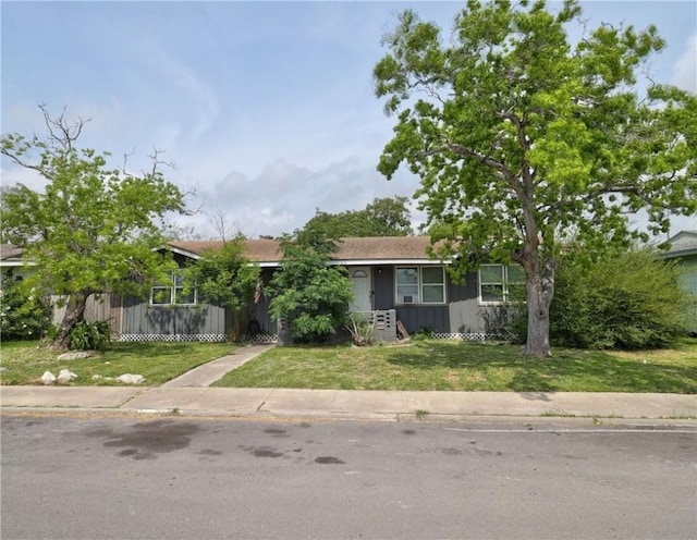1809 Merriman Ave, Corpus Christi, TX 78412 - view of front of home with a front lawn