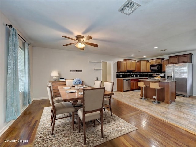 1809 Merriman Ave, Corpus Christi, TX 78412 - dining space featuring light wood-type flooring, baseboards, visible vents, recessed lighting, and ceiling fan