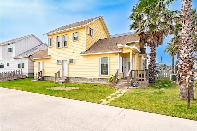 315 Oleander St Unit 2B, Port Aransas, TX 78373 - view of front of property featuring entry steps and a shingled roof