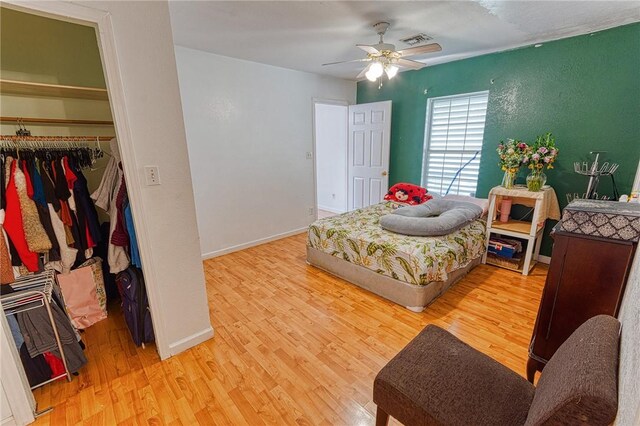1309 Annapolis Dr, Corpus Christi, TX 78415 - bedroom featuring wood finished floors, a closet, and baseboards