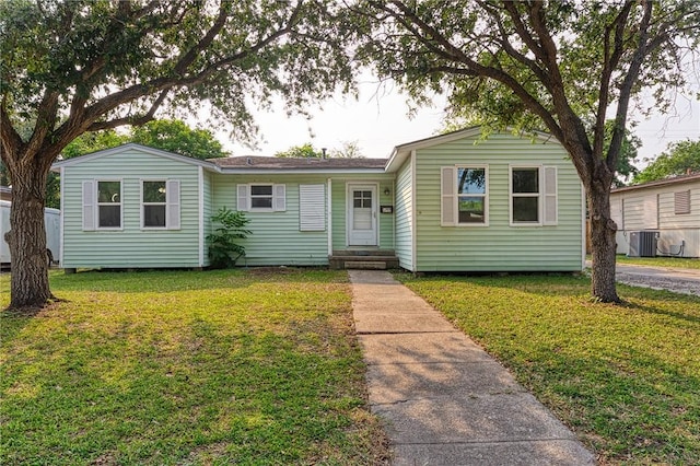 1309 Annapolis Dr, Corpus Christi, TX 78415 - single story home with central AC unit and a front yard