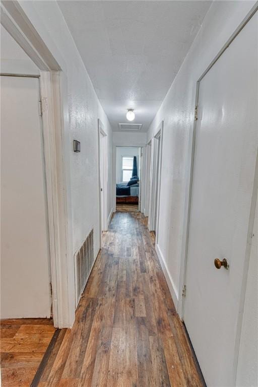 1309 Annapolis Dr, Corpus Christi, TX 78415 - hallway featuring wood finished floors