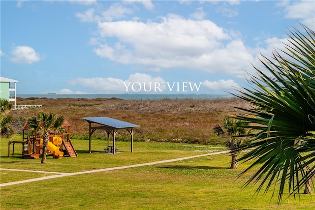 view of jungle gym with a lawn