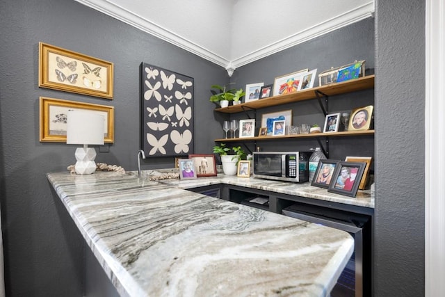 home office featuring beverage cooler and a sink